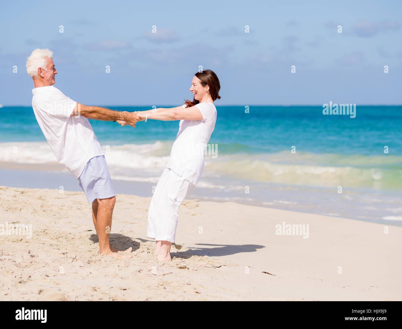Beautiful mature couple dancing together hi-res stock photography and ...