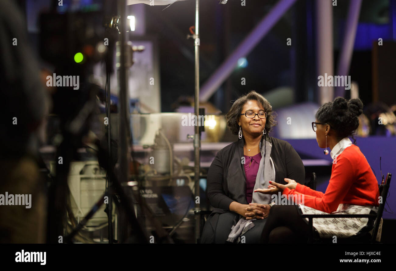 Program Executive for Game Changing Development in NASA’s Space Technology Mission Directorate LaNetra Tate, left, speaks with American musical recording artist, actress, and model Janelle Monáe, right, about the movie “Hidden Figures” during taping of media interviews, Tuesday, Dec. 13, 2016, at the Smithsonian’s National Air and Space Museum in Washington, DC. The film is based on the book of the same title, by Margot Lee Shetterly, and chronicles the lives of Katherine Johnson, Dorothy Vaughan and Mary Jackson -- African-American women working at NASA as “human computers,” who were critical Stock Photo