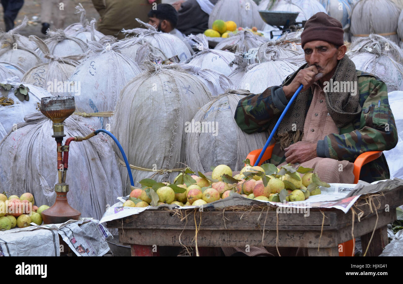 Lahore, Pakistan. 24th Jan, 2017. Pakistani people busy in their ...