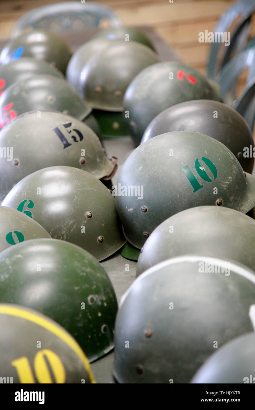 Military helmets at a tank driving experience day Stock Photo