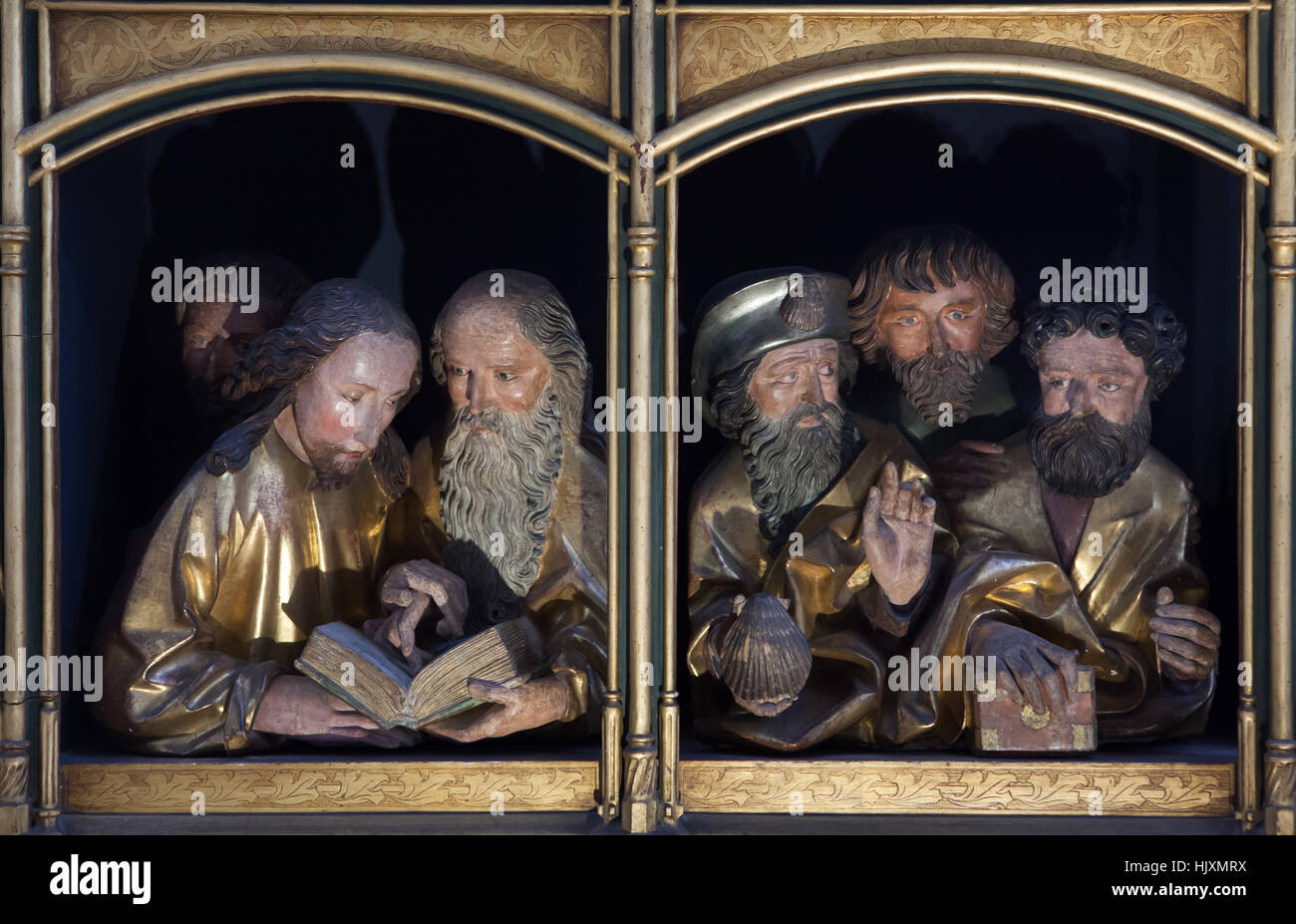 Six apostles attributed to German late gothic sculptor Nikolaus Hagenauer. Wooden statues in the predella of the Isenheim Altarpiece displayed in the Musee d'Unterlinden (Unterlinden Museum) in Colmar, Alsace, France. Stock Photo