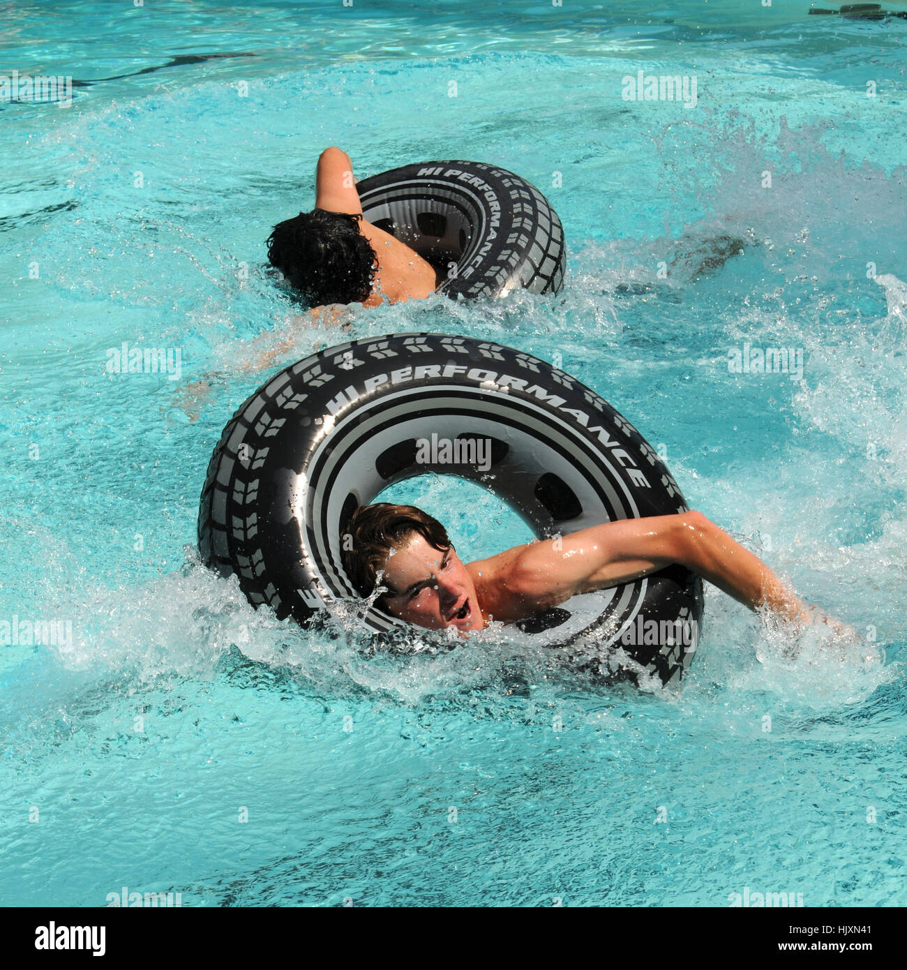 Swimming boys by the pool hires stock photography and images Alamy