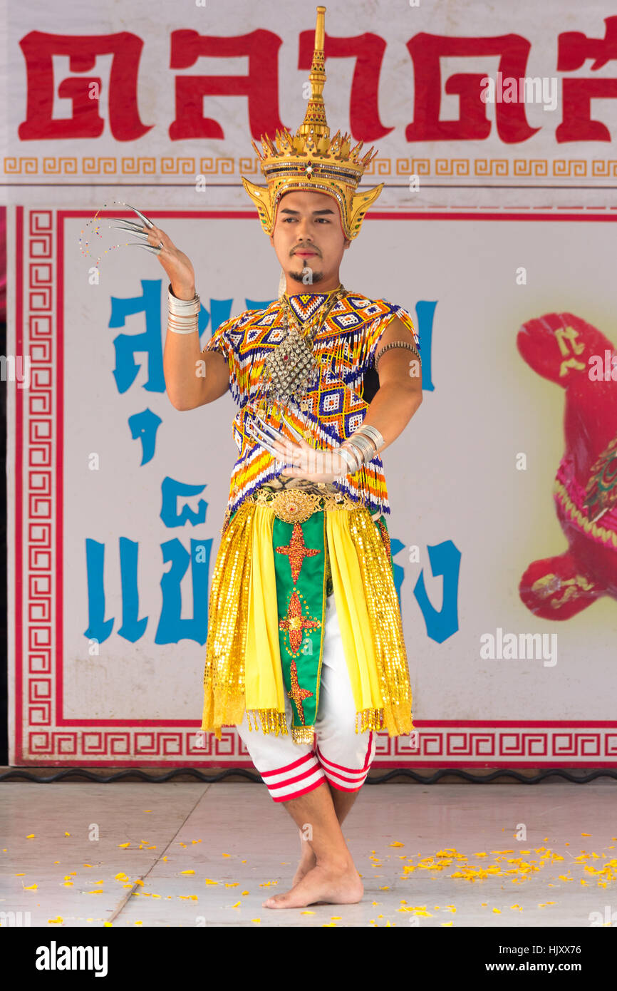 Male dancer in traditional Thai costume at festival in old Phuket Town,  Thailand Stock Photo - Alamy
