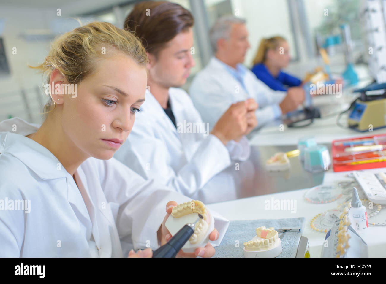 making artificial teeth Stock Photo - Alamy