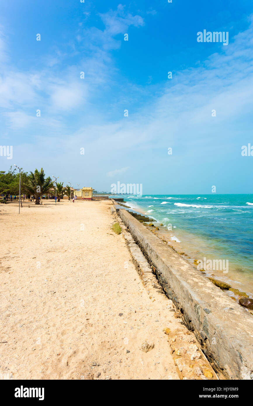 Landscape view of the beach and ocean adjacent to Keerimalai Hot Springs on a sunny day on the northern coast of Jaffna, Sri Lan Stock Photo