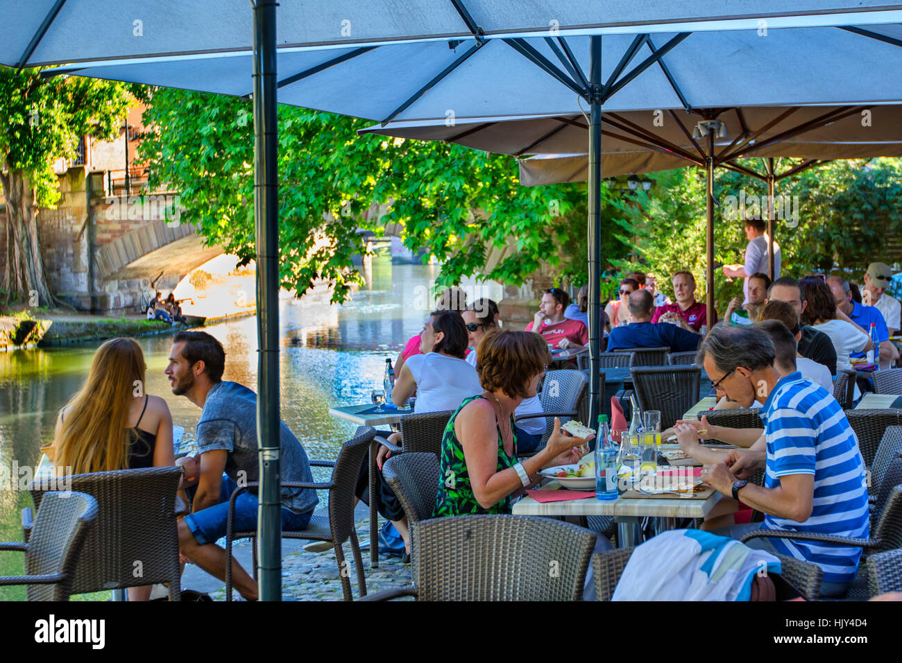 People Relaxing In A Cafe In Petite France District Strasbourg Stock