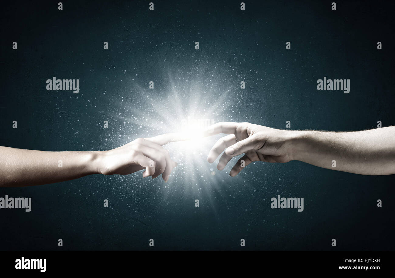 Close up of human hands reaching each other with fingers Stock Photo ...
