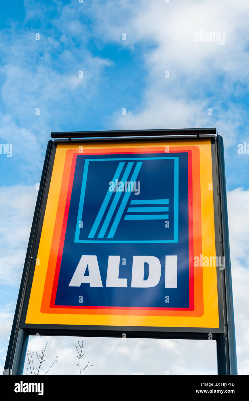 An Aldi shop sign with a blue sky and copy space. Stock Photo