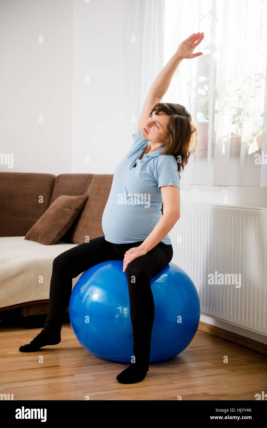 Woman Female Belly Tummy Pregnancy Exercise Pregnant Exercising woman-female-belly-tummy-pregnancy-exercise-pregnant-exercising