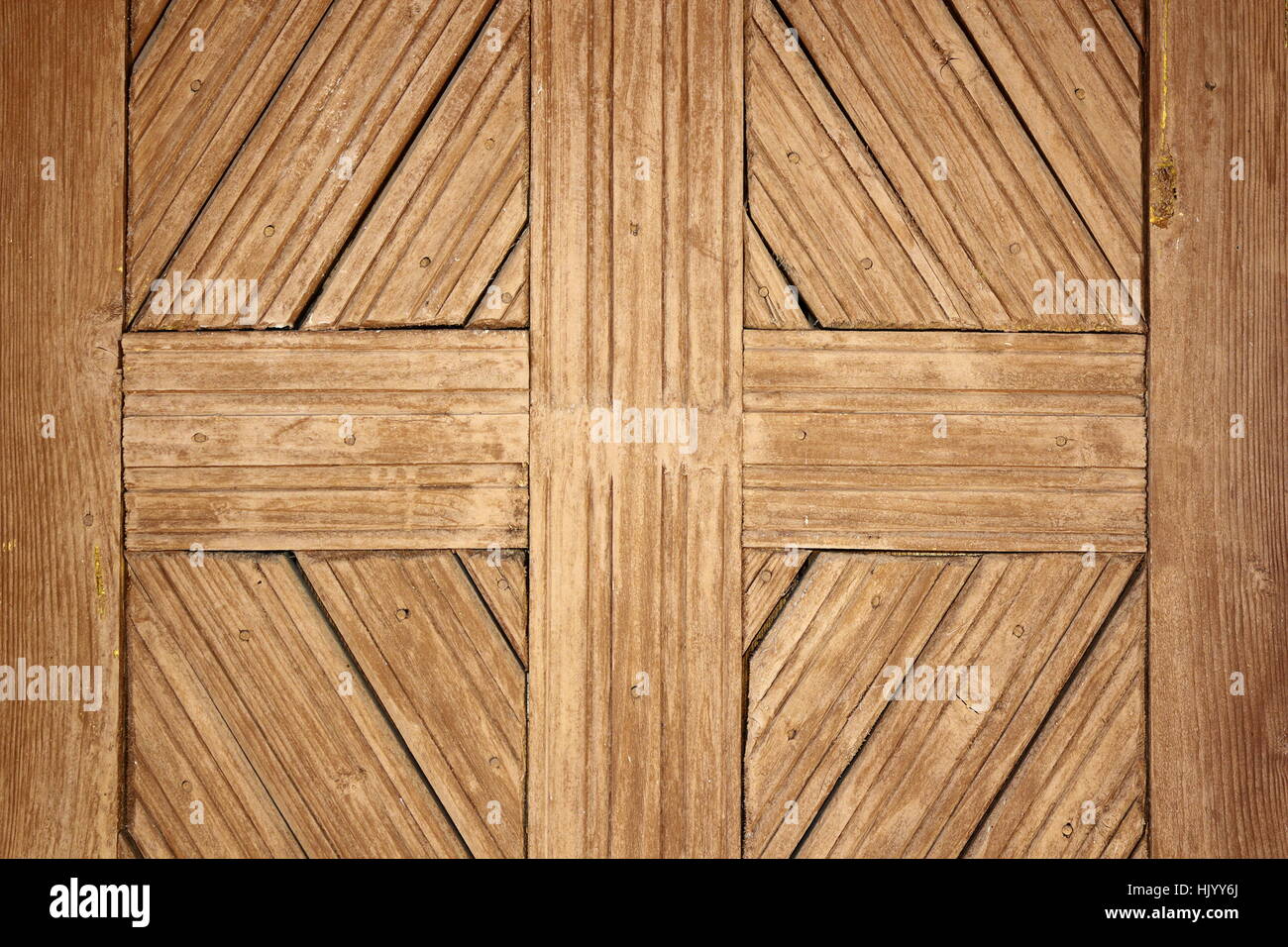 detail on old romanian wooden door, handmade ancient wood texture Stock Photo