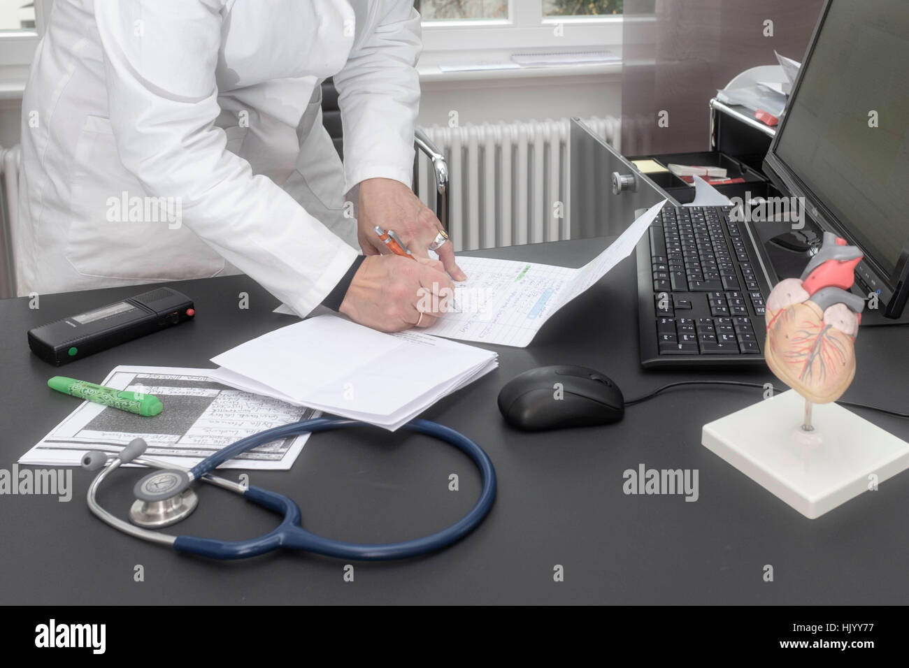 Files stethoscope desk medical practice doctors hands hi-res stock ...