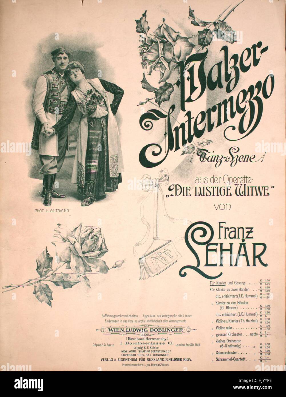 Sheet music cover image of the song 'Walzer-Intermezzo', with original authorship notes reading 'von Franz Lehar Text von Victor Leon und Leo Stein', 1905. The publisher is listed as 'Ludwig Doblinger (Bernhard Herzmansky)', the form of composition is 'sectional', the instrumentation is 'piano and voice', the first line reads 'Lippen schweigen, 's flustern Geigen', and the illustration artist is listed as 'photo by L. Gutmann of unidentified persons; Musikaliendruckerei v. Jos. Eberle and Co. Wien.'. Stock Photo