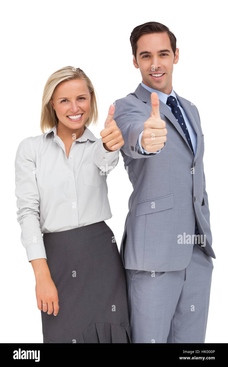 Business people showing thumbs up on white background Stock Photo - Alamy