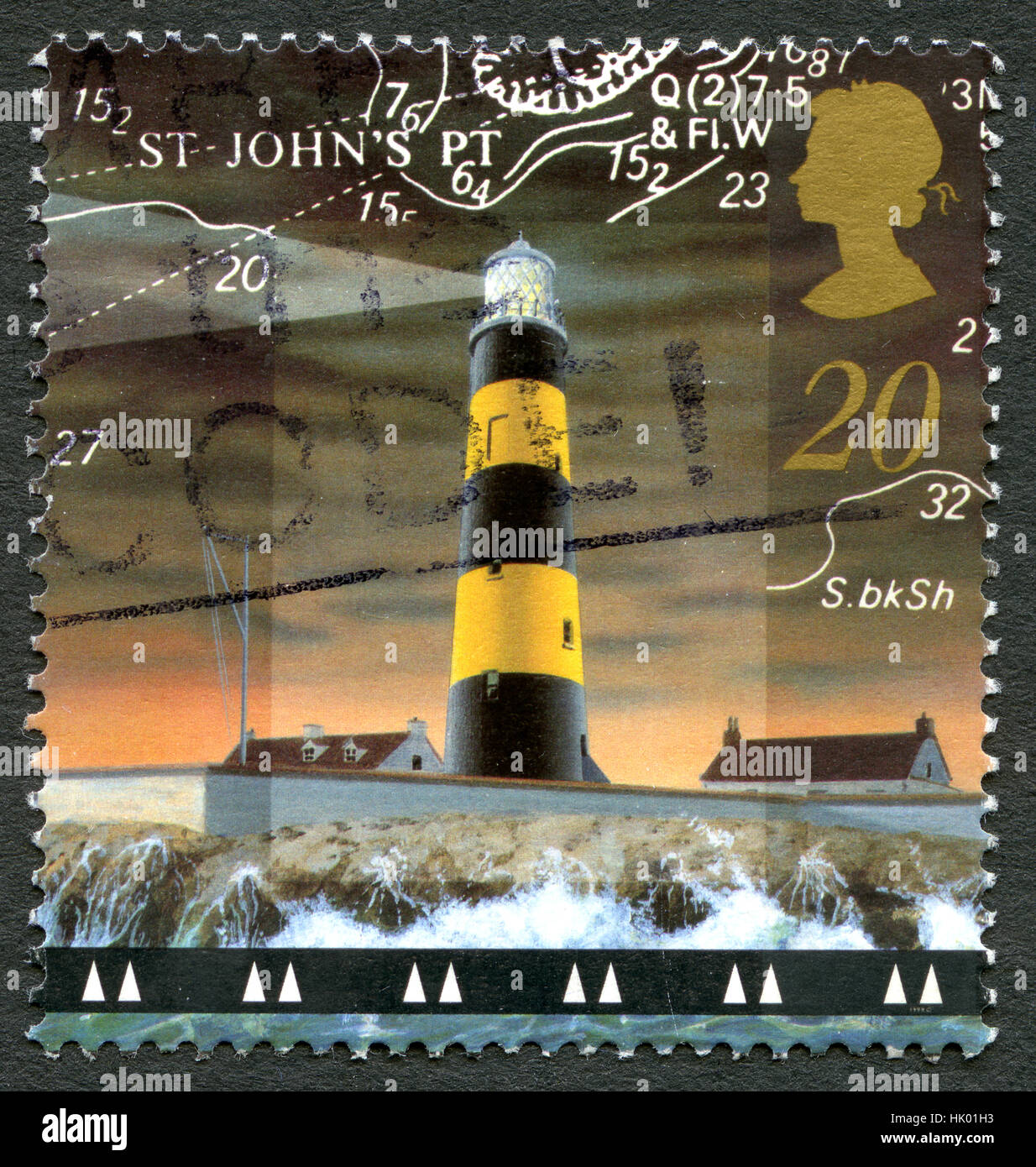 GREAT BRITAIN - CIRCA 1998: A used postage stamp from the UK, depicting an illustration of historic St. Johns Point Lighthouse in Northern Ireland, ci Stock Photo