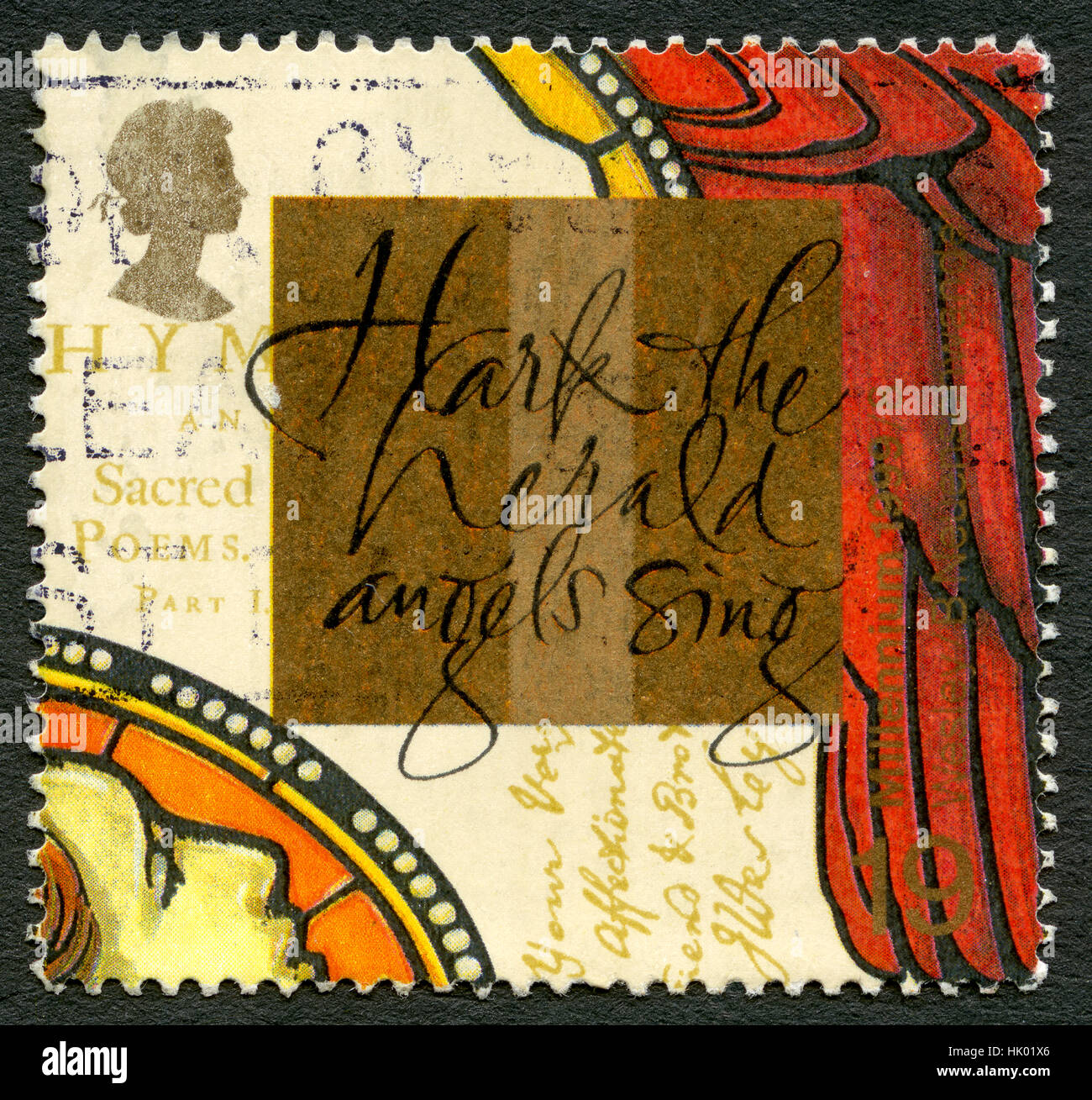 GREAT BRITAIN - CIRCA 1991: A used postage stamp from the UK, portraying the words to a Christmas Carol - Hark the Herald Angels Sing, circa 1999. Stock Photo