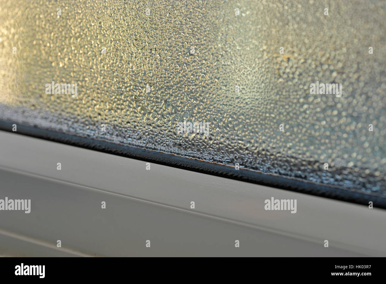Condensation and damp problem on the inside of a double glazed window. Stock Photo