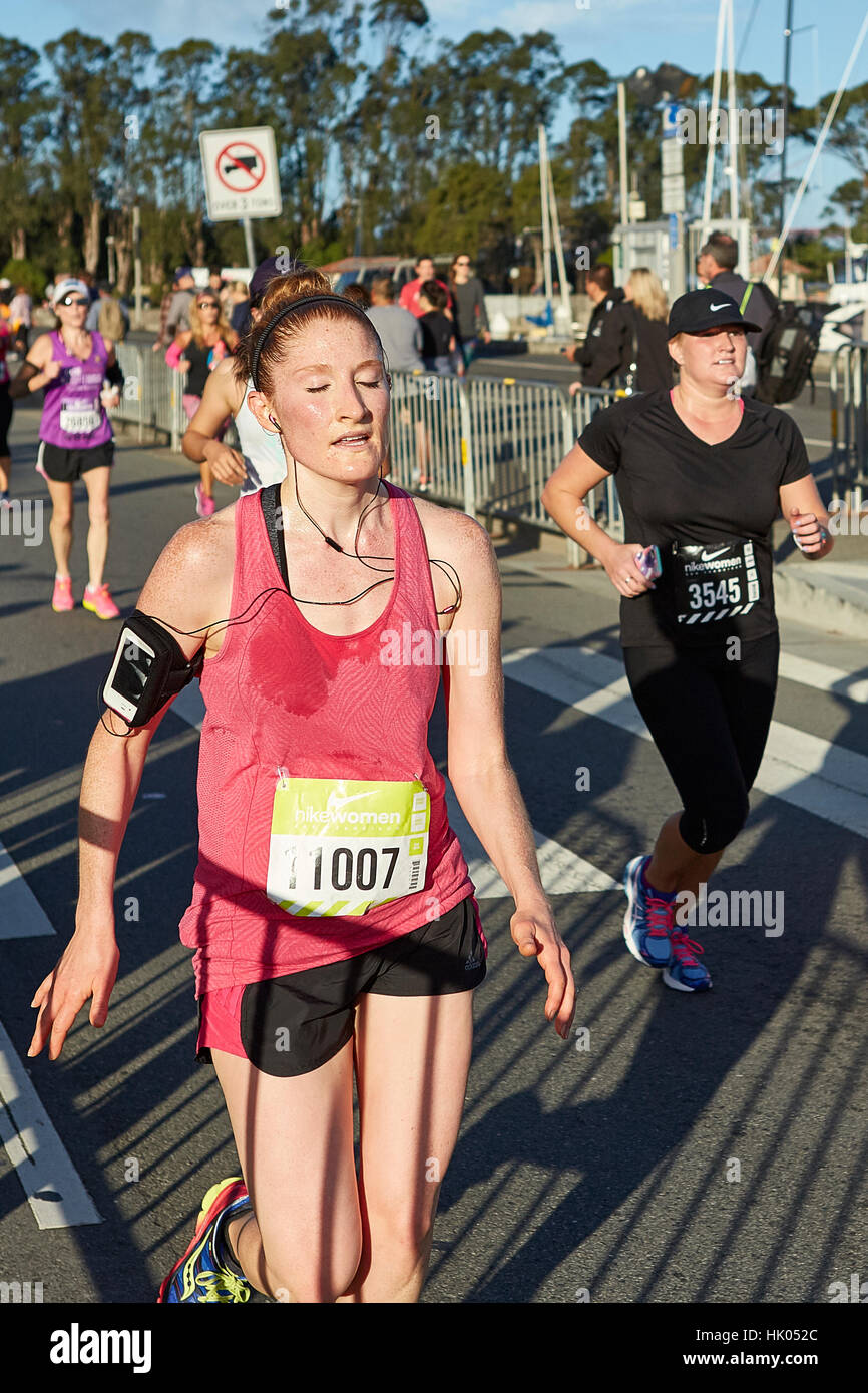 Relief For A Female Athlete Running In The Nike Woman's Half Marathon, San Francisco, 2015. Stock Photo