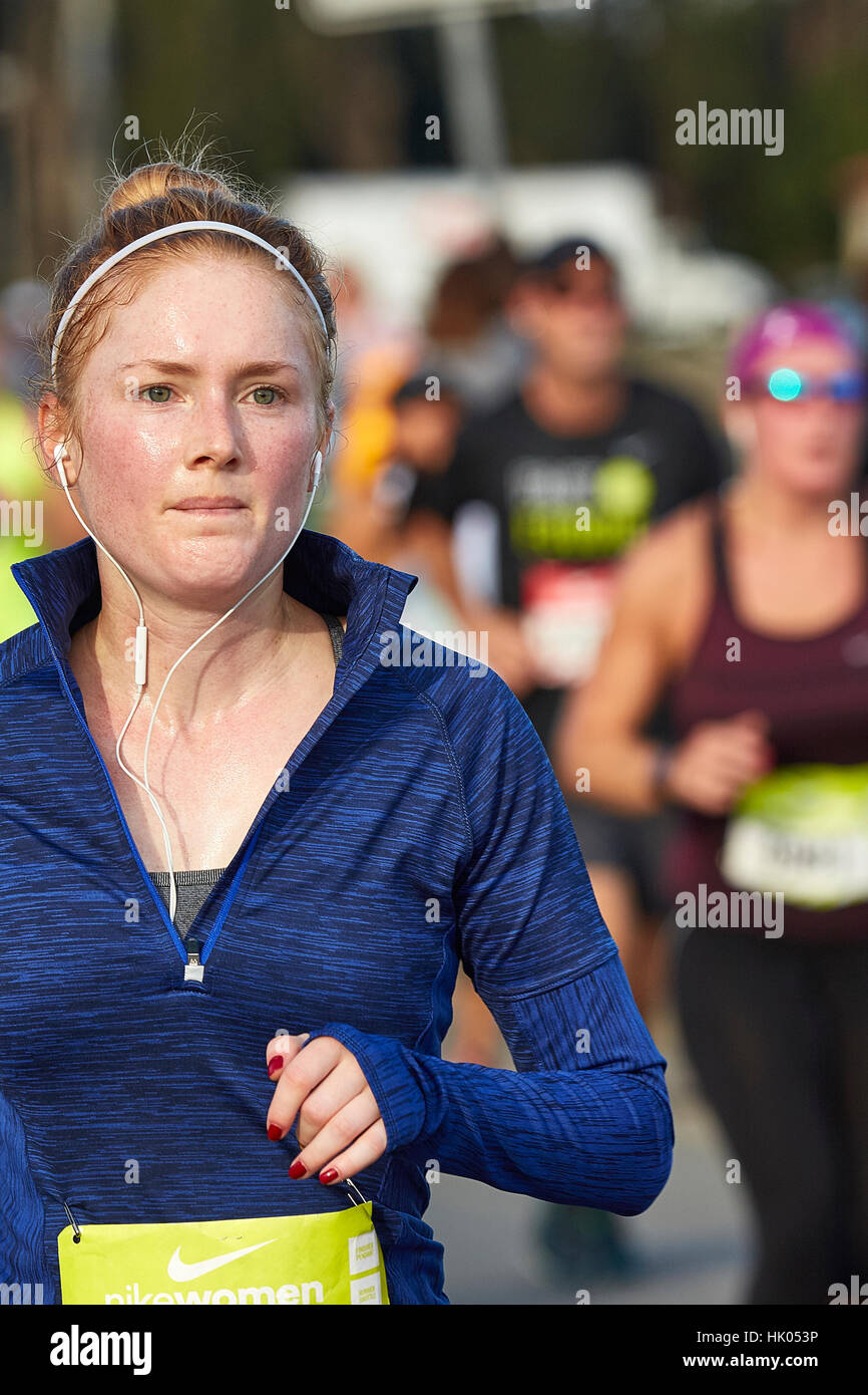 Focused Female Athlete Running In The Nike Woman's Half Marathon, San Francisco, 2015. Stock Photo