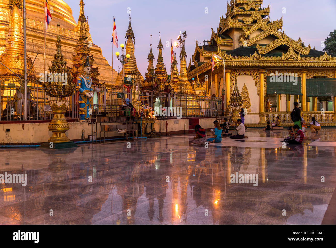 the buddhist Shwemokhtaw Pagoda at dusk, Pathein, Myanmar, Asia Stock