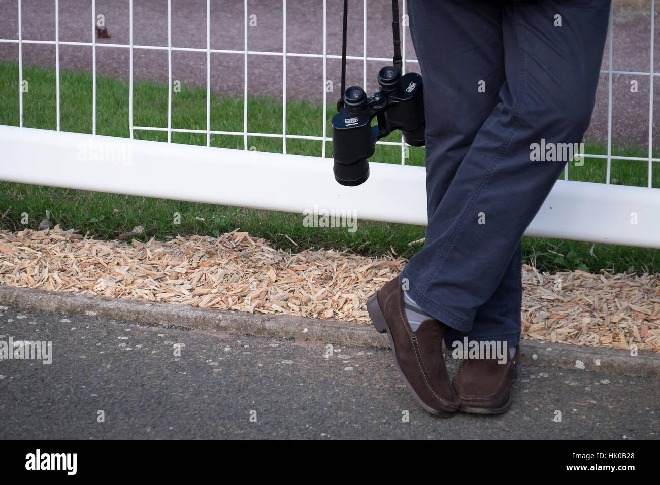Racing: feet and binoculars Stock Photo