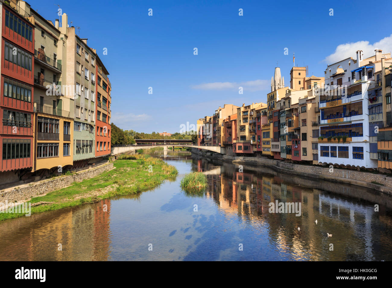 Distinctive historic colourful arcaded houses and Onyar River, Girona
