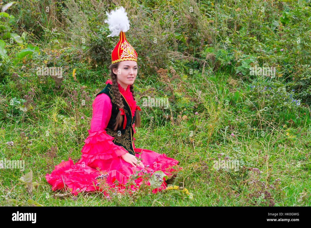 Young Kazakh woman, Kazakh ethnographical village Aul Gunny, Talgar city, Almaty, Kazakhstan, Central Asia Stock Photo