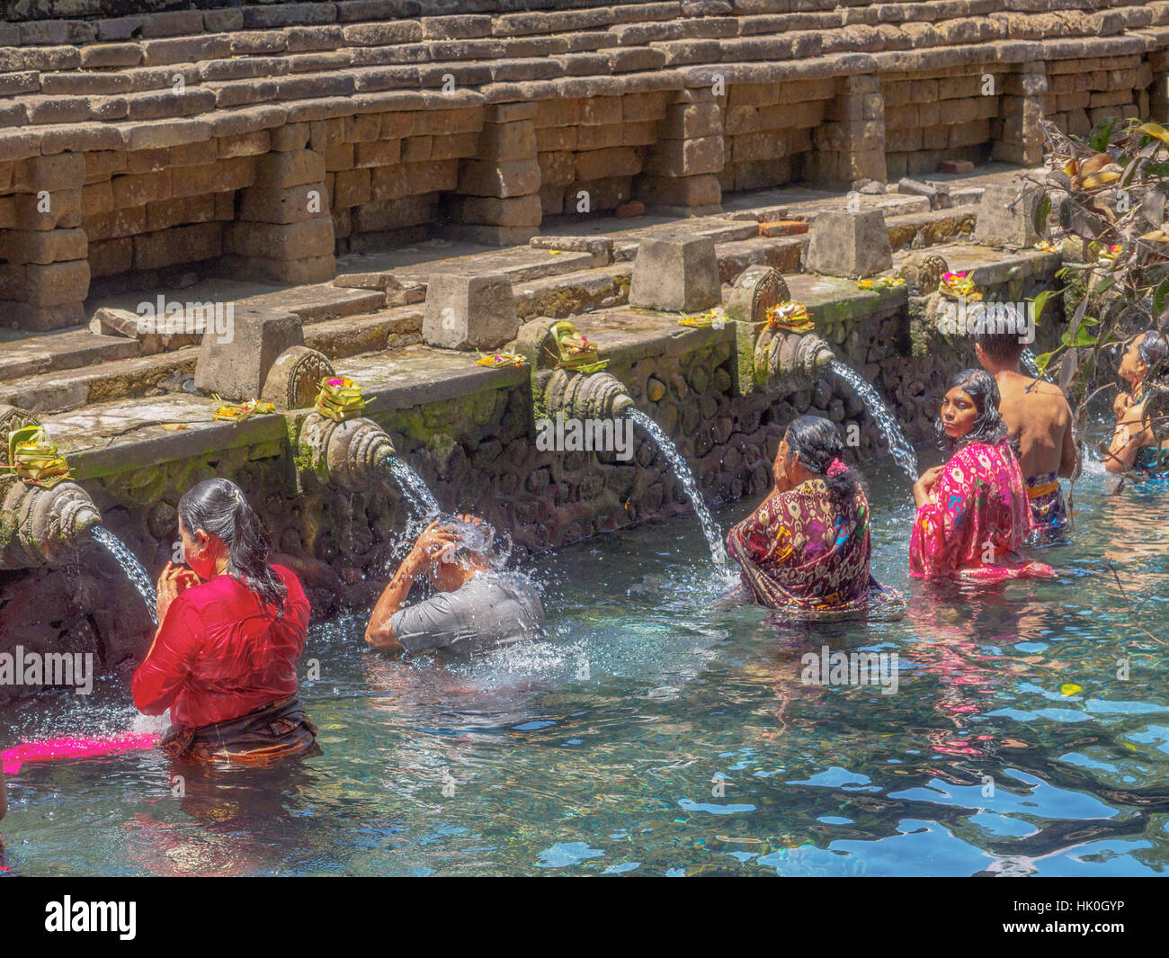 Bathing in the holy waters of Pura Tirta Empul, Bali, Indonesia, Southeast Asia Stock Photo