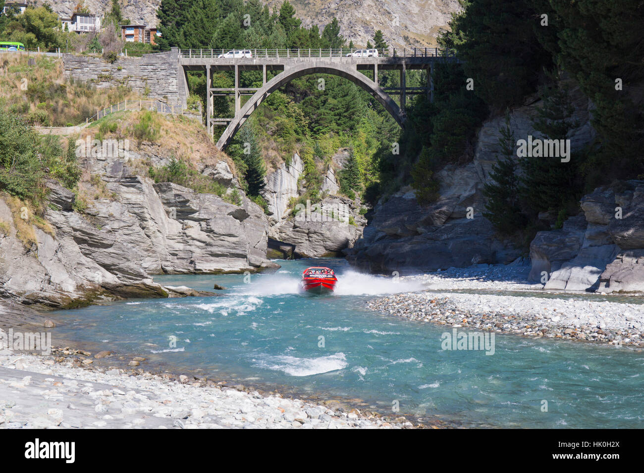 Jet boat on the Shotover River below the Edith Cavell Bridge, Queenstown, Queenstown-Lakes district, Otago, New Zealand Stock Photo