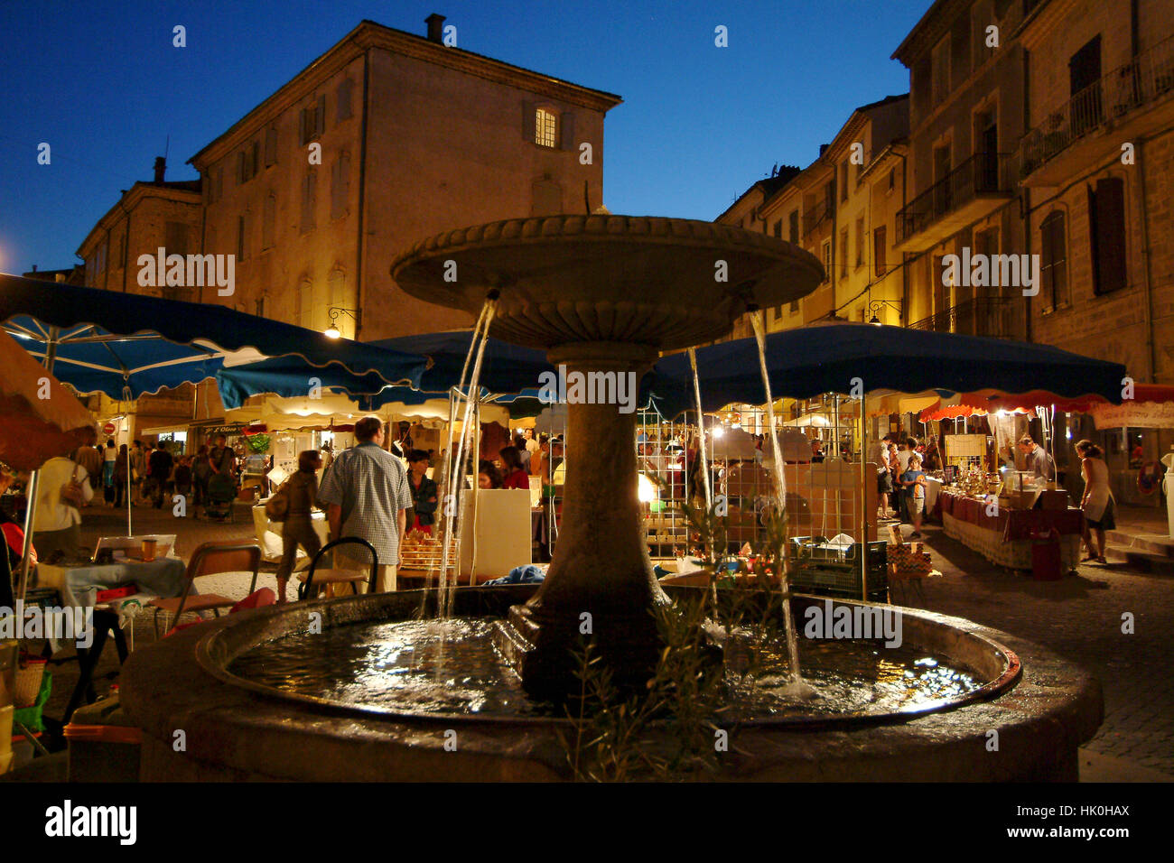 France, Ardeche, Les Vans, the night market, the central square with its  fountain Stock Photo - Alamy