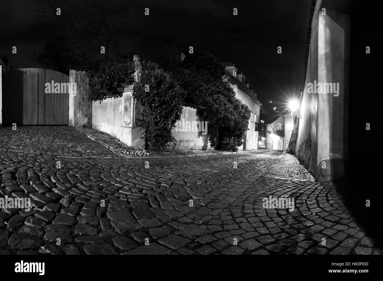 B&W Night time view on castle alley New World, Prague Castle, Hradcany, Czech Republic Stock Photo