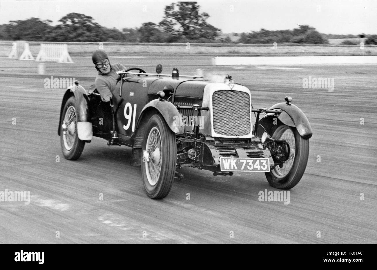 D.W.K. Kitchener in 1928 Alvis 12-75 fwd at Silverstone 23/7/1960 Stock Photo