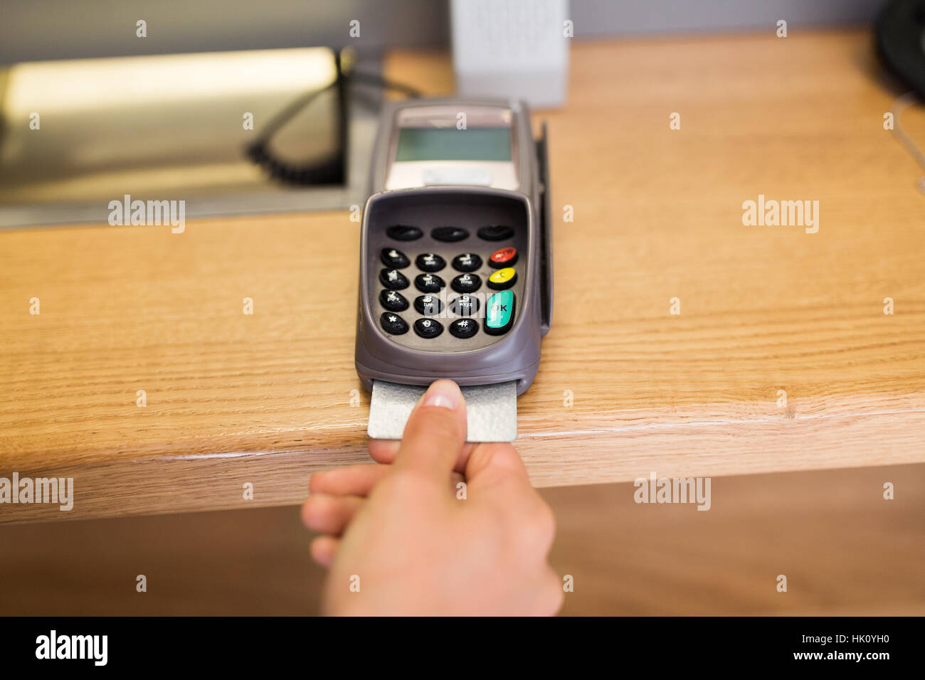 Terminal card pos hand hi-res stock photography and images - Alamy