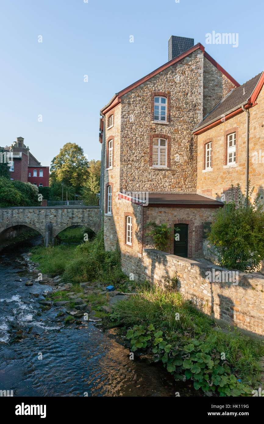 Old town of stolberg in north rhine westphalia. Former copper manufactury (Kupferhof) in the Sonnentalstrasse, Enkereistrasse with the creek 'Vicht' Stock Photo