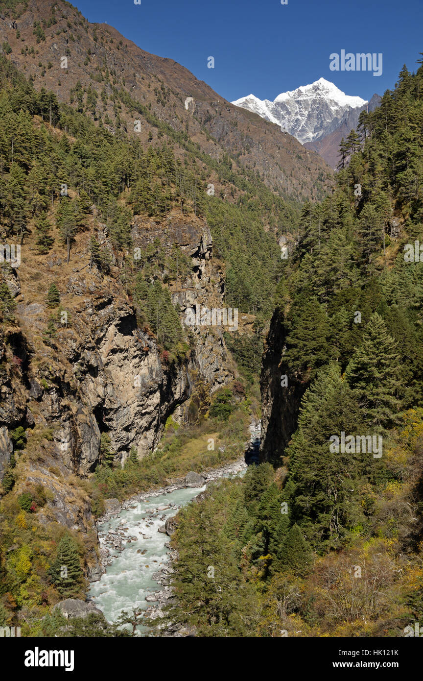 Himalayan Dhudh Khosi River Gorge with distant Cholatse Peak Stock Photo