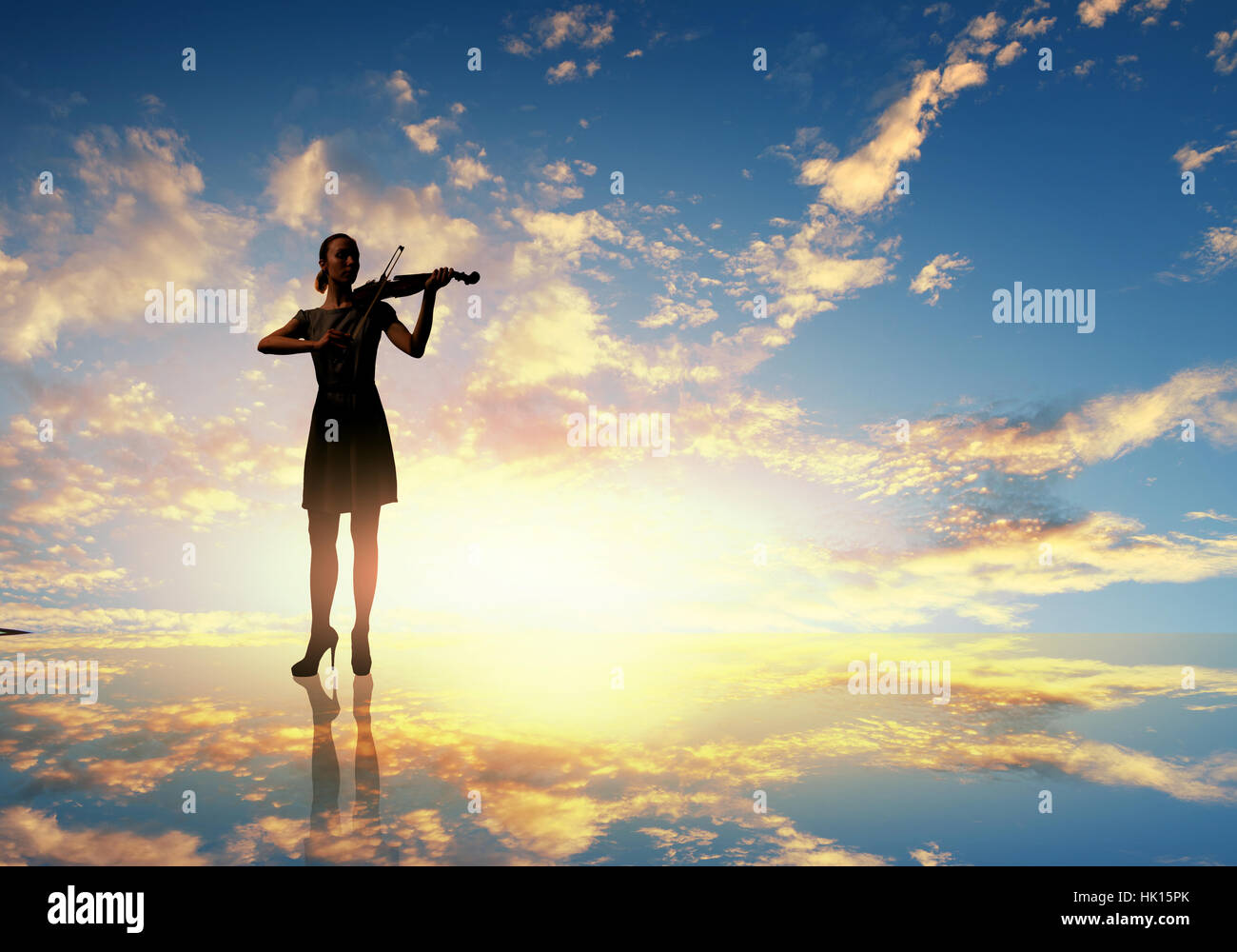 Silhouette of woman playing violin at sunrise Stock Photo - Alamy