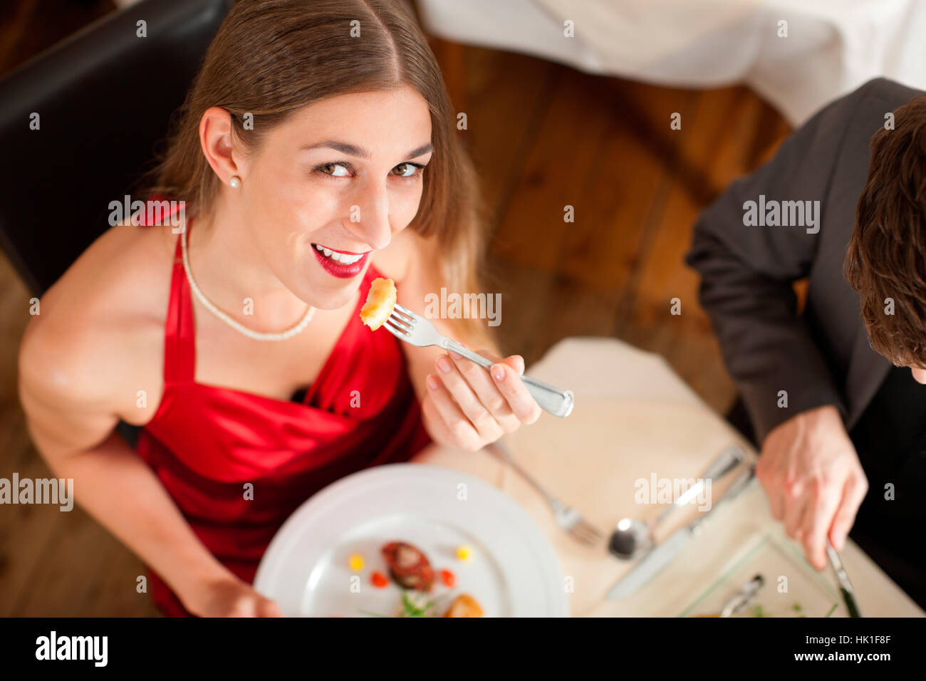 couple eating and drinking in a very good restaurant Stock Photo Alamy