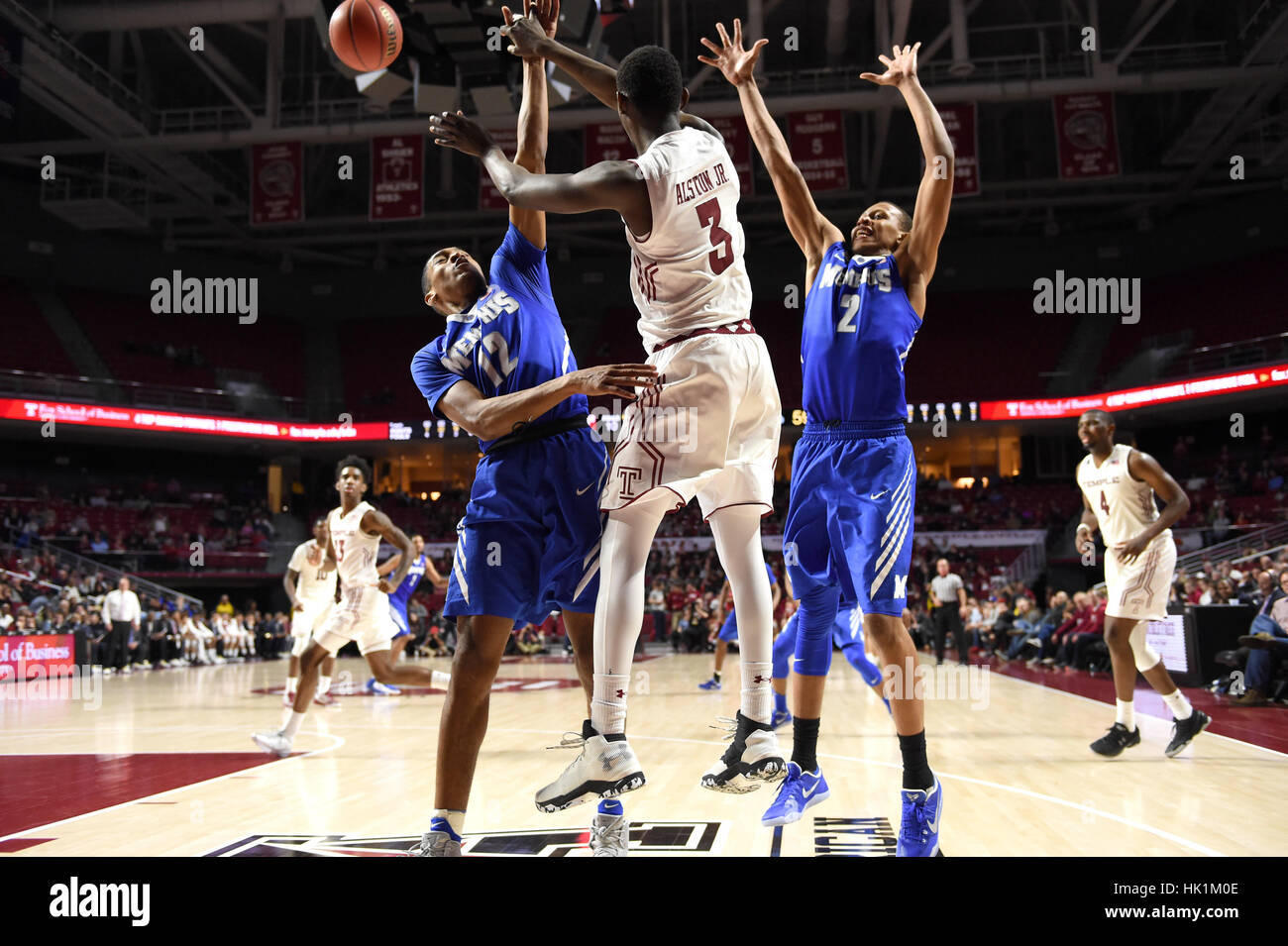 Philadelphia, Pennsylvania, USA. 25th Jan, 2017. Temple Owls guard SHIZZ ALSTON JR. (3) passes out of a double team trap during the American Athletic Conference basketball game being played at the Liacouras Center in Philadelphia. Temple beat Memphis 77-66. Credit: Ken Inness/ZUMA Wire/Alamy Live News Stock Photo