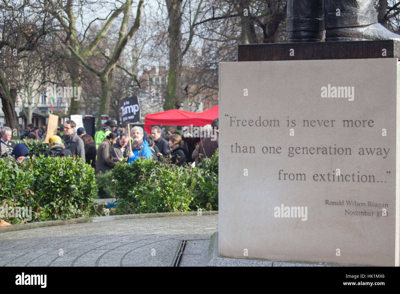 London, UK. 4th February, 2017. Regan statue and quote on Freedom at 4th Feb 2017 London March against Donald Trump Credit: Pauline A Yates/Alamy Live News Stock Photo