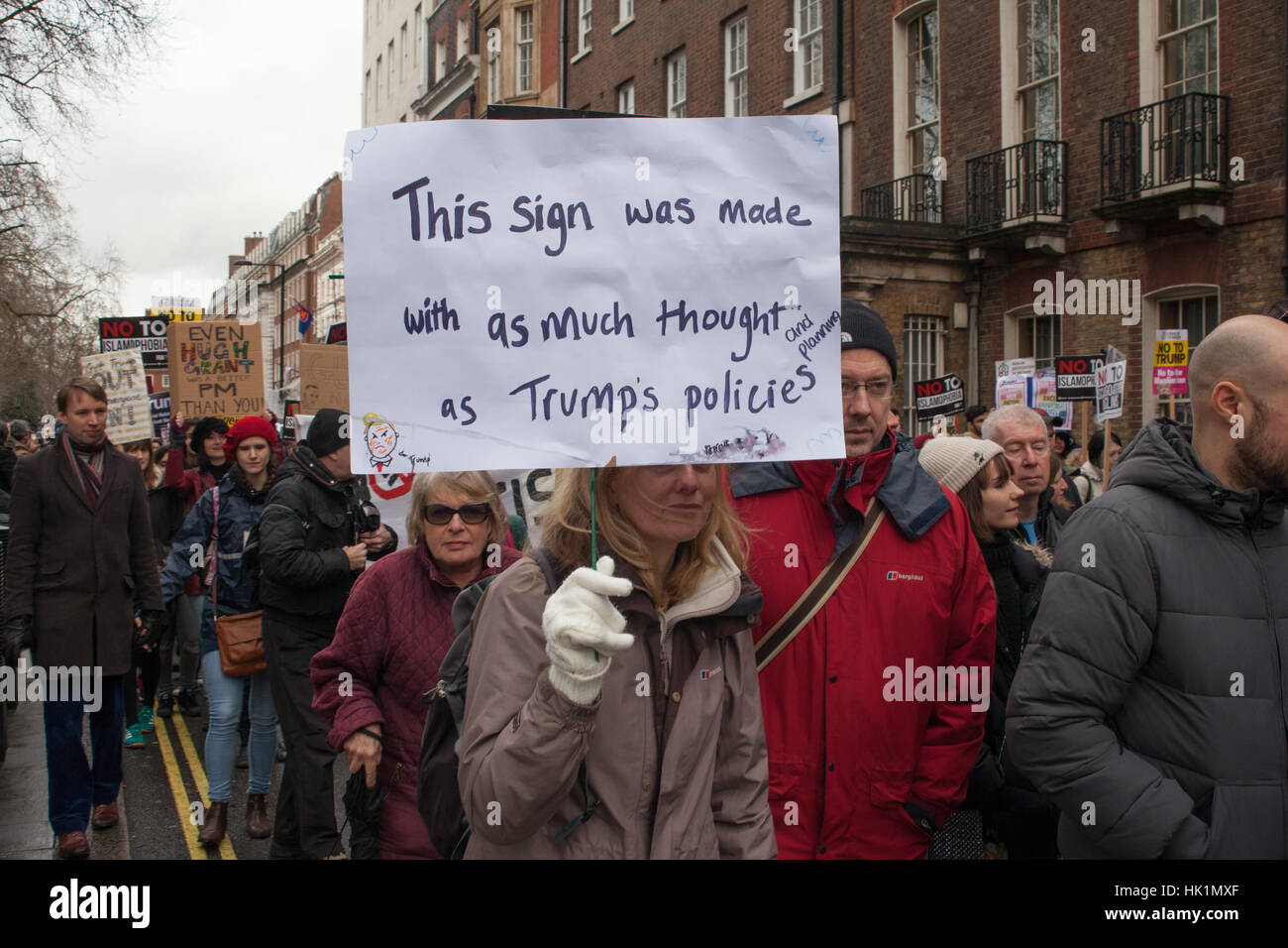 London, UK. 4th February, 2017. Placard on Trump's policies seen at 4th Feb 2017 London March against Donald Trump Credit: Pauline A Yates/Alamy Live News Stock Photo