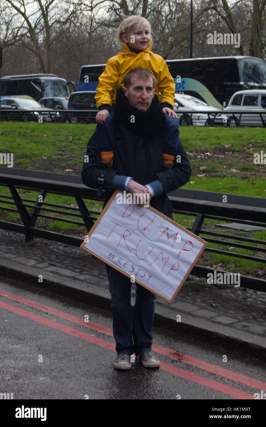 London, UK. 4th February, 2017. Father and Daughter at 4th Feb 2017 London March against Donald Trump Credit: Pauline A Yates/Alamy Live News Stock Photo