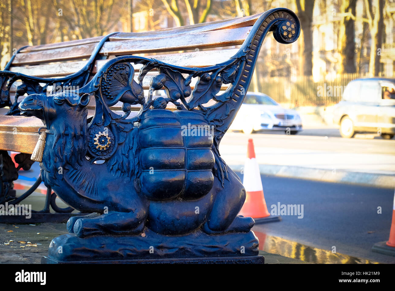 A city bench with carving of camel as part of its design Stock Photo