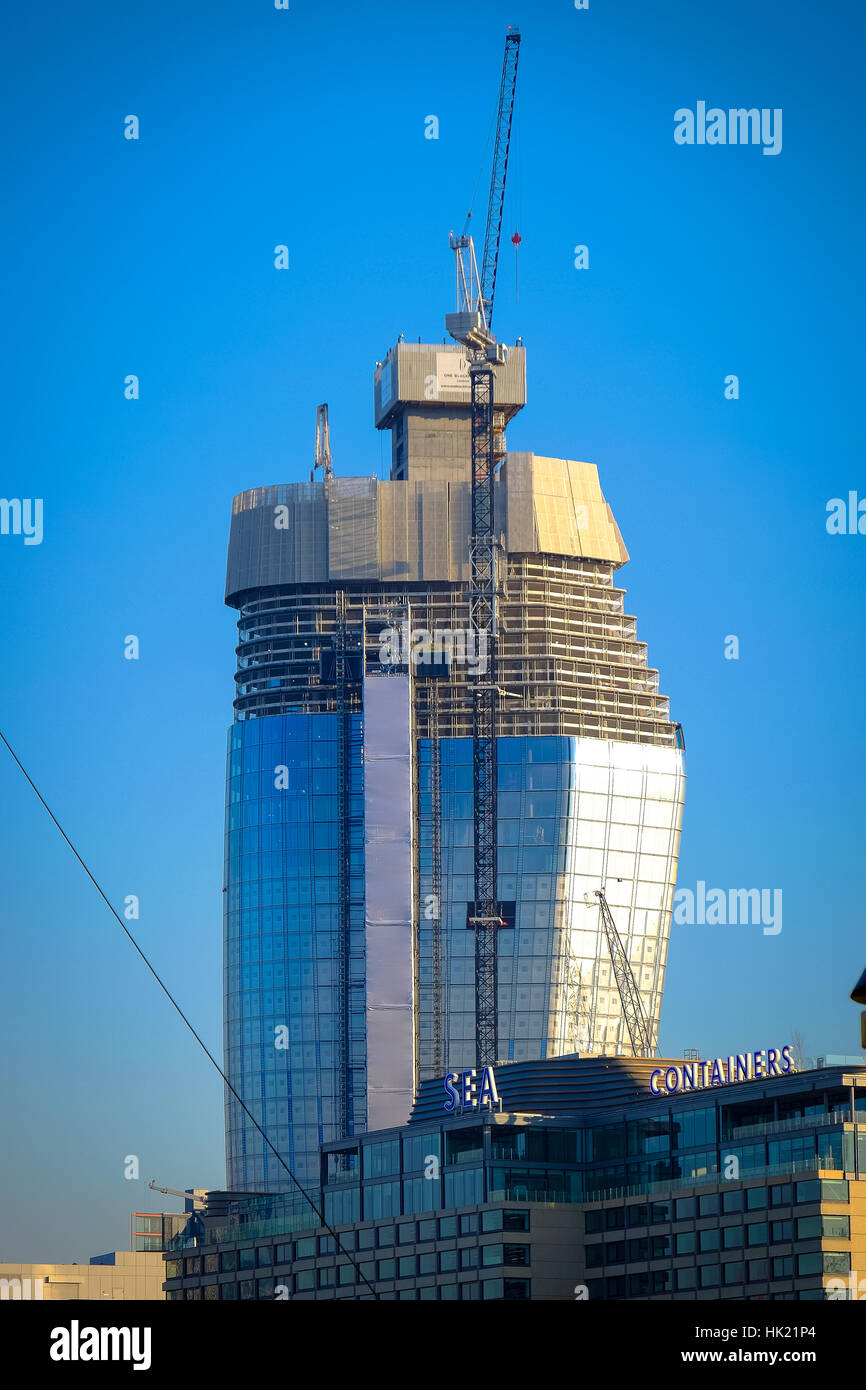 A partial constructed skyscraper dominates the skyline Stock Photo