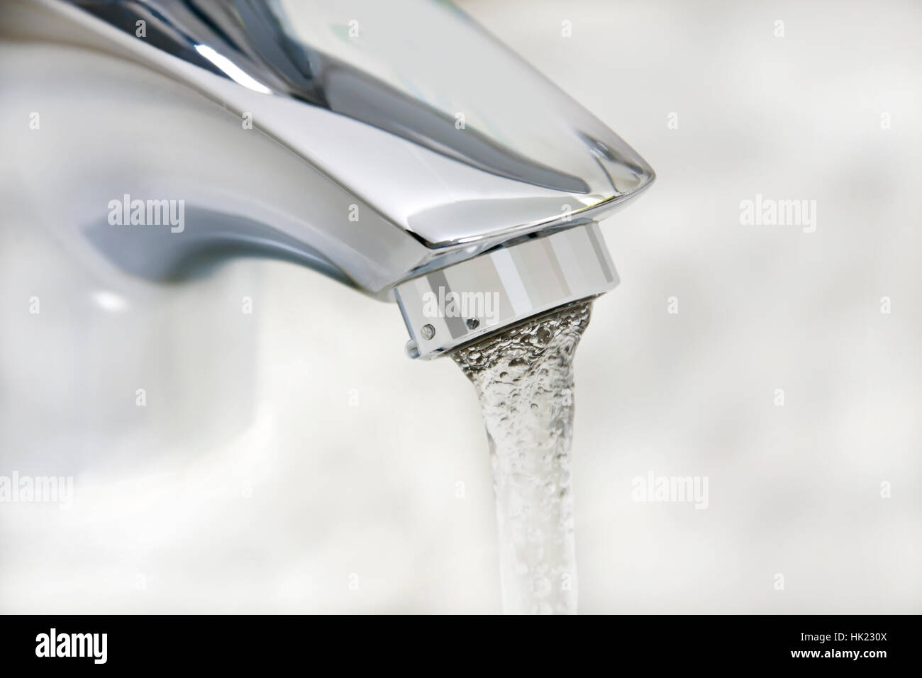 water running from an open faucet Stock Photo Alamy