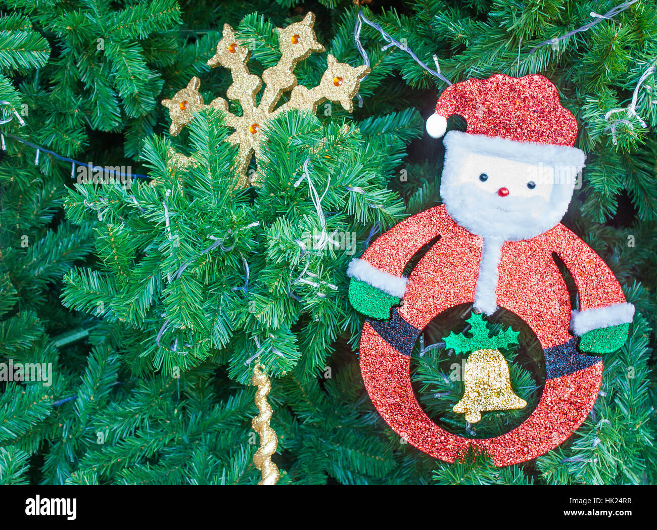 Foamed Plastic Sheet Santa Claus On Pine Bush Christmas Tree Background Stock Photo