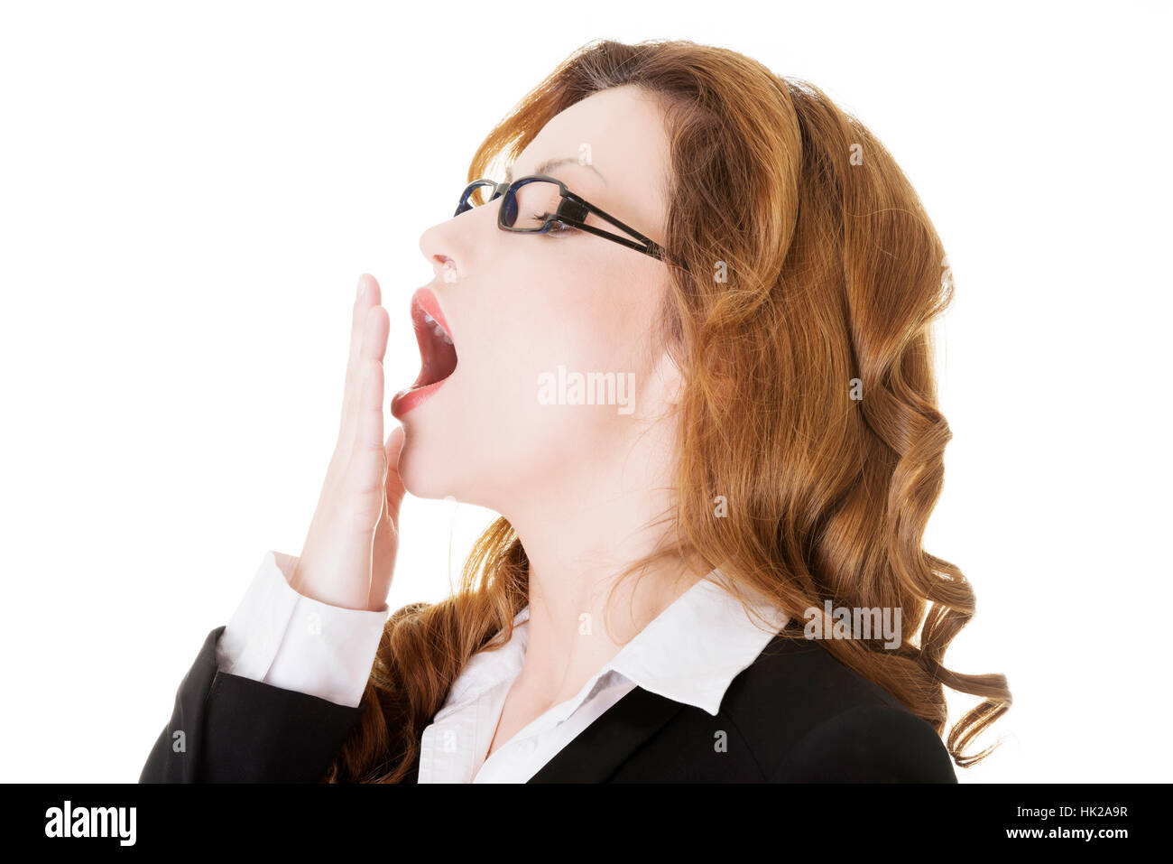 Tired business woman in a suit ,isolated over white background Stock ...