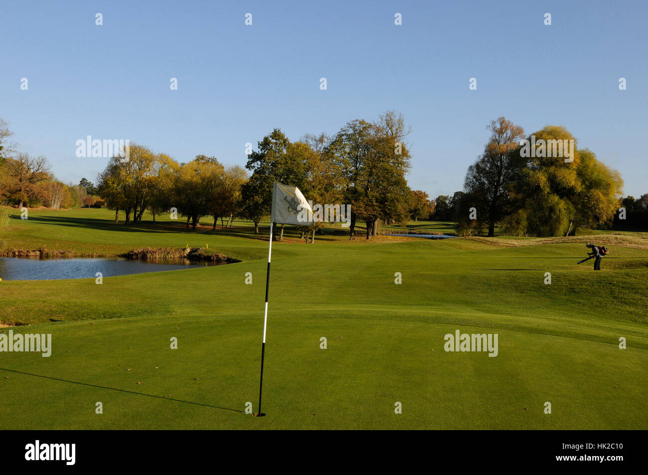 View over the 17th Green towards the Lake and fairway in the Autumn, Hanbury Manor, Ware, Hertfordshire, England Stock Photo