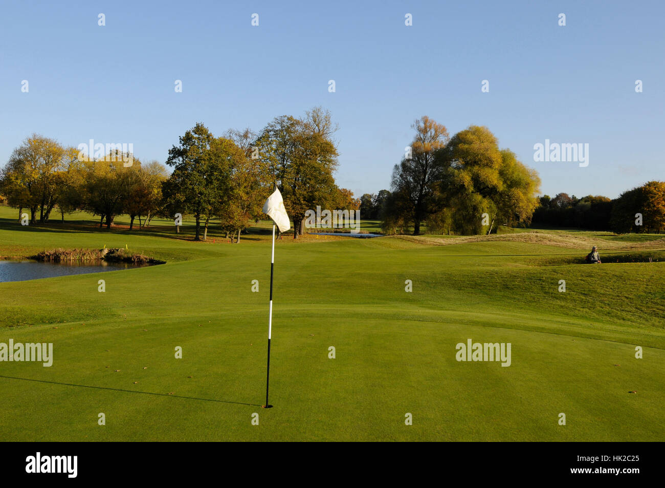 View over the 17th Green towards the Lake and fairway in the Autumn, Hanbury Manor, Ware, Hertfordshire, England Stock Photo