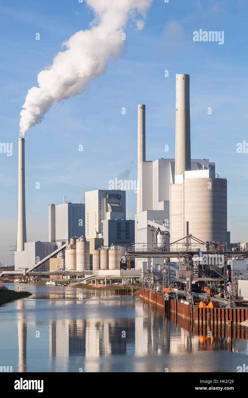 Overall View of a Coal-fired Power Station on a Sunny Day with Blue Sky Stock Photo