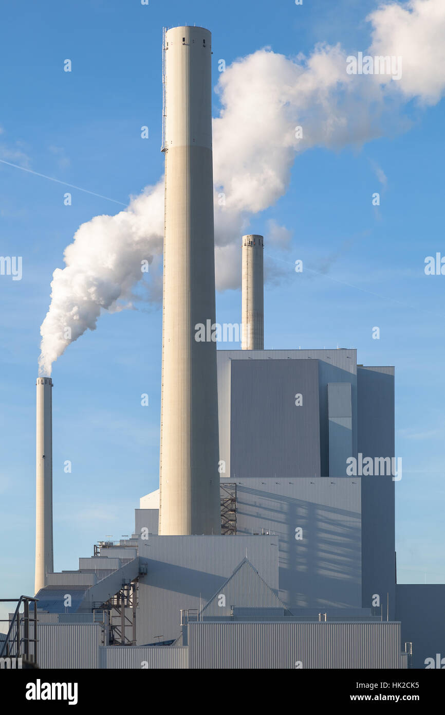 Close-up of a Coal-fired Power Station on a Sunny Day with Blue Sky Stock Photo