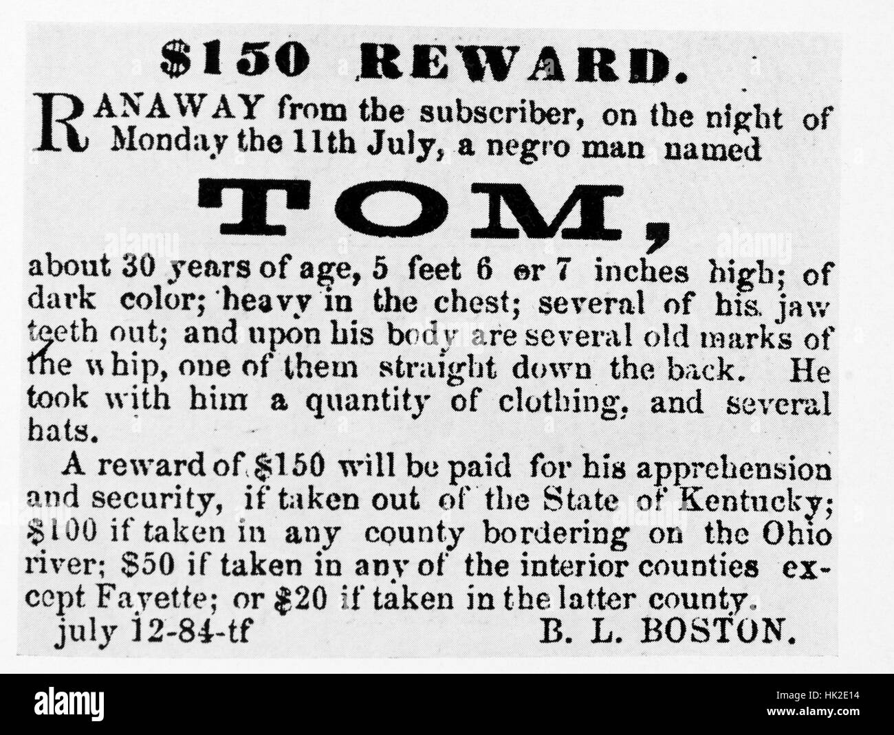 A poster offering a reward of for the capture of a runaway slave identified as Tom, the poster gives a physical description of Tom's body including scars left by whipping, a tiered structure of payment starting at $150 for capture outside of Kentuky and decreasing as low as $20 for capture within Fayette County is listed, the payments all depend on the geographical location of Tom's capture, the notice was created by B.L. Boston, 1940. From the New York Public Library. Stock Photo